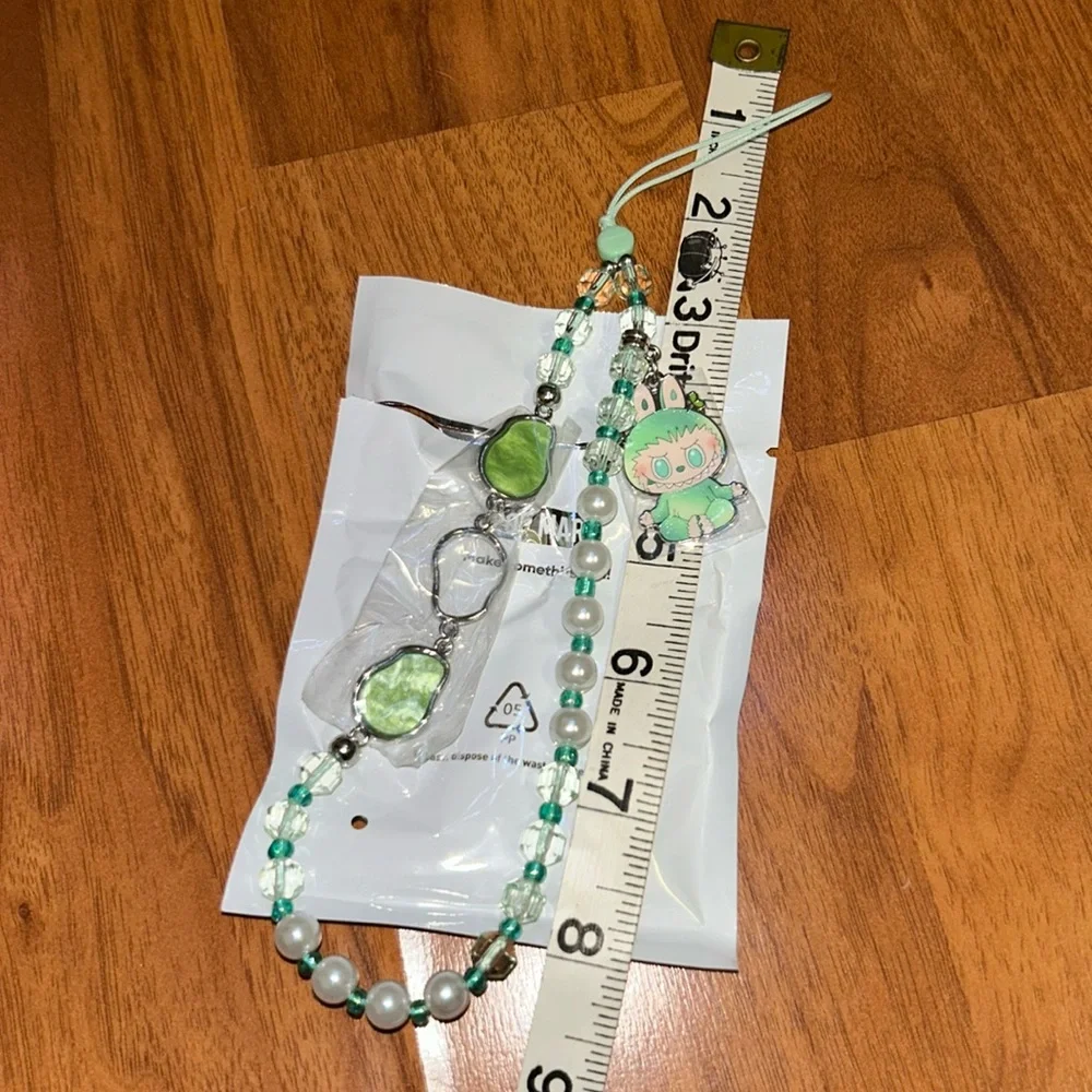 Brand New in Box THE MONSTERS Big Into Energy Phone Charm ‘SERENITY’